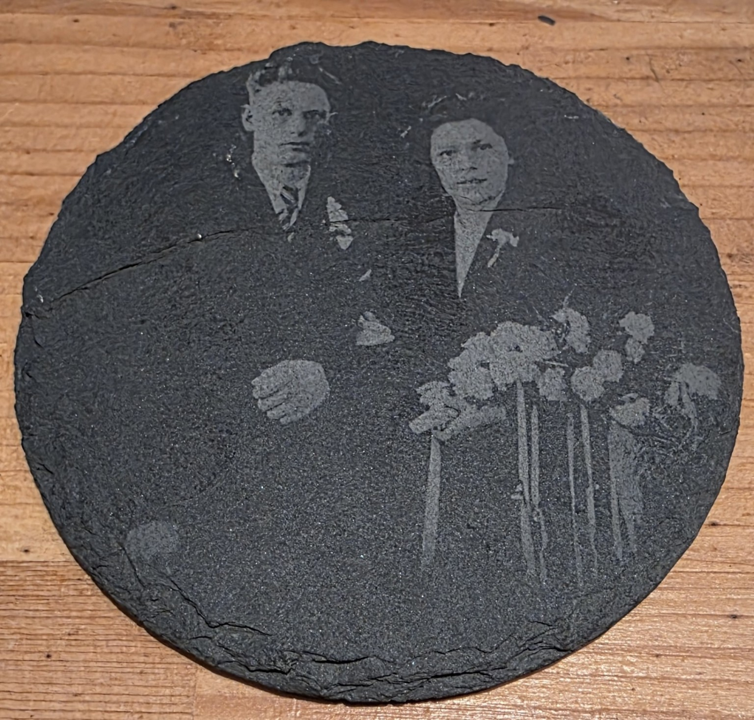 Finished wedding photograph engraved on a round slate coaster