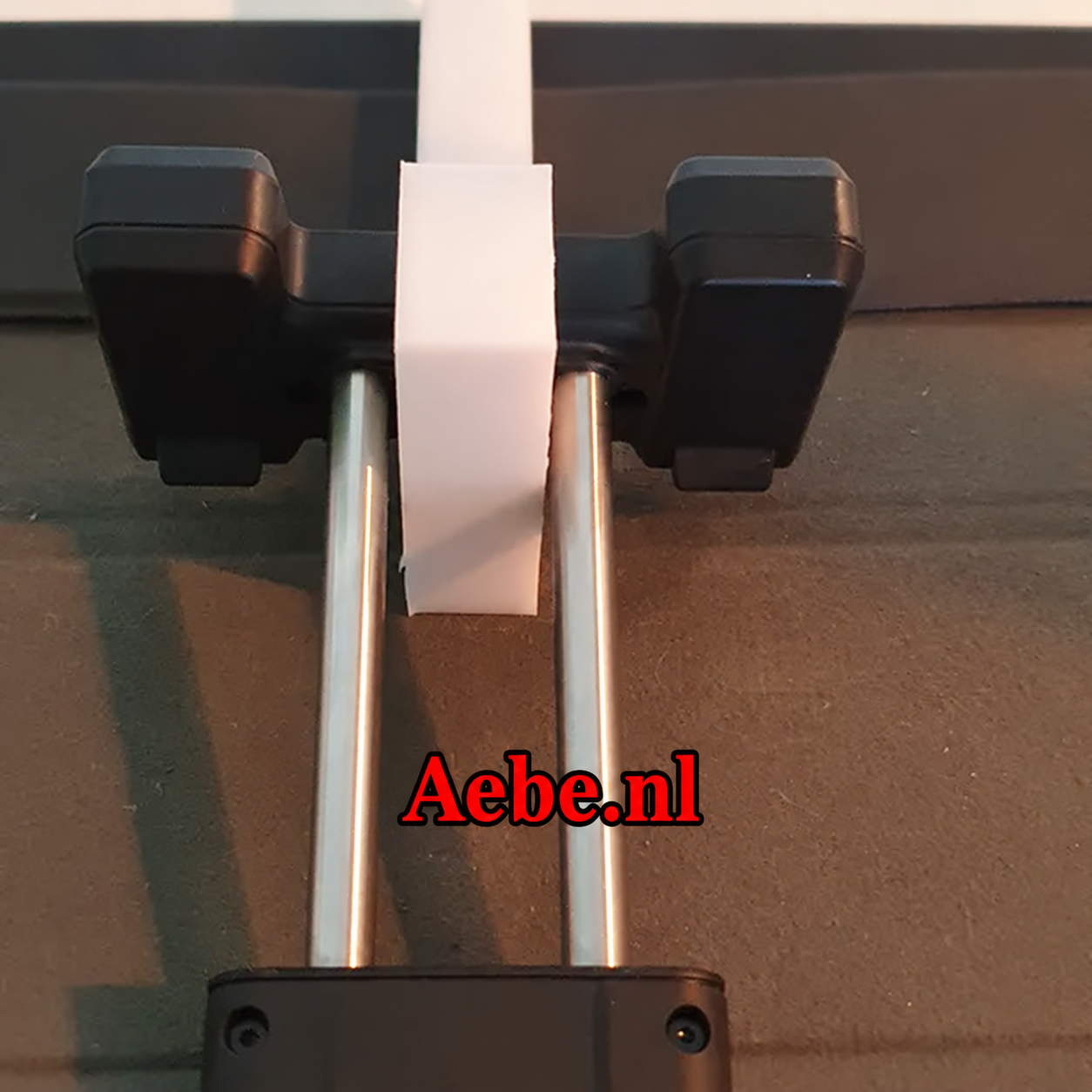 3D-printed extender from above, between the arms of the DJI Mavic Air 2 phone clamp